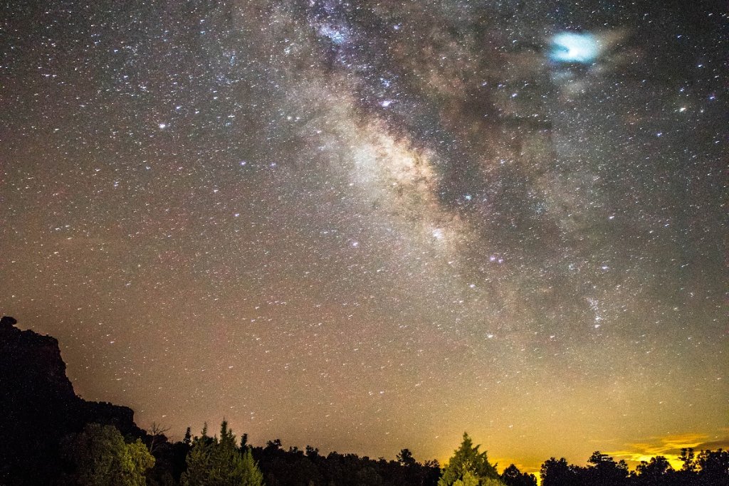 Starry night sky and Milky Way over Sedona's red rocks