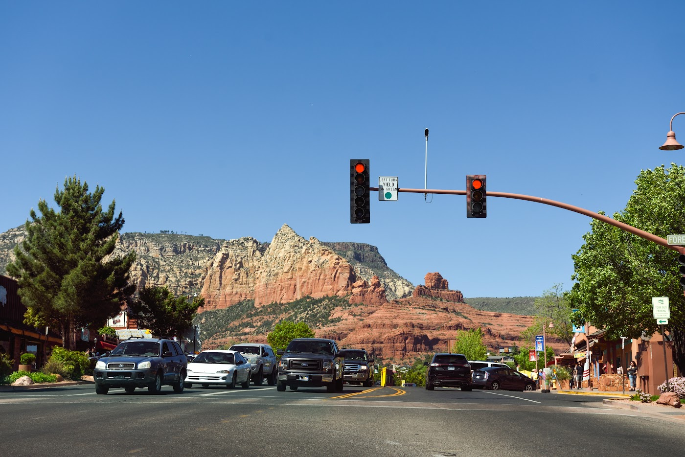 Road traffic near Sedona's red rock scenery