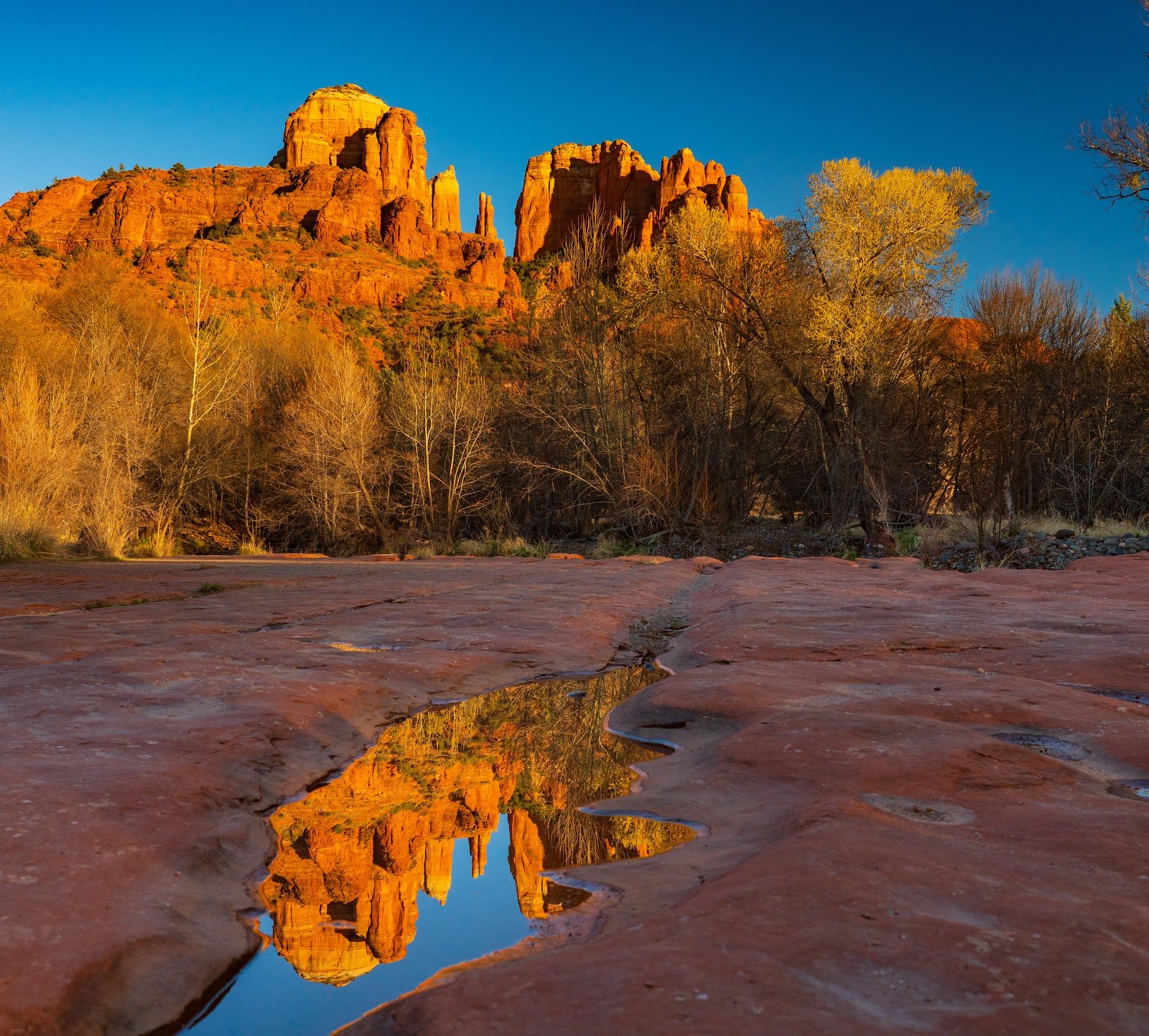 Cathedral Rock reflected in Oak Creek at sunset, the big Sunday hike of a Village of Oak Creek weekend