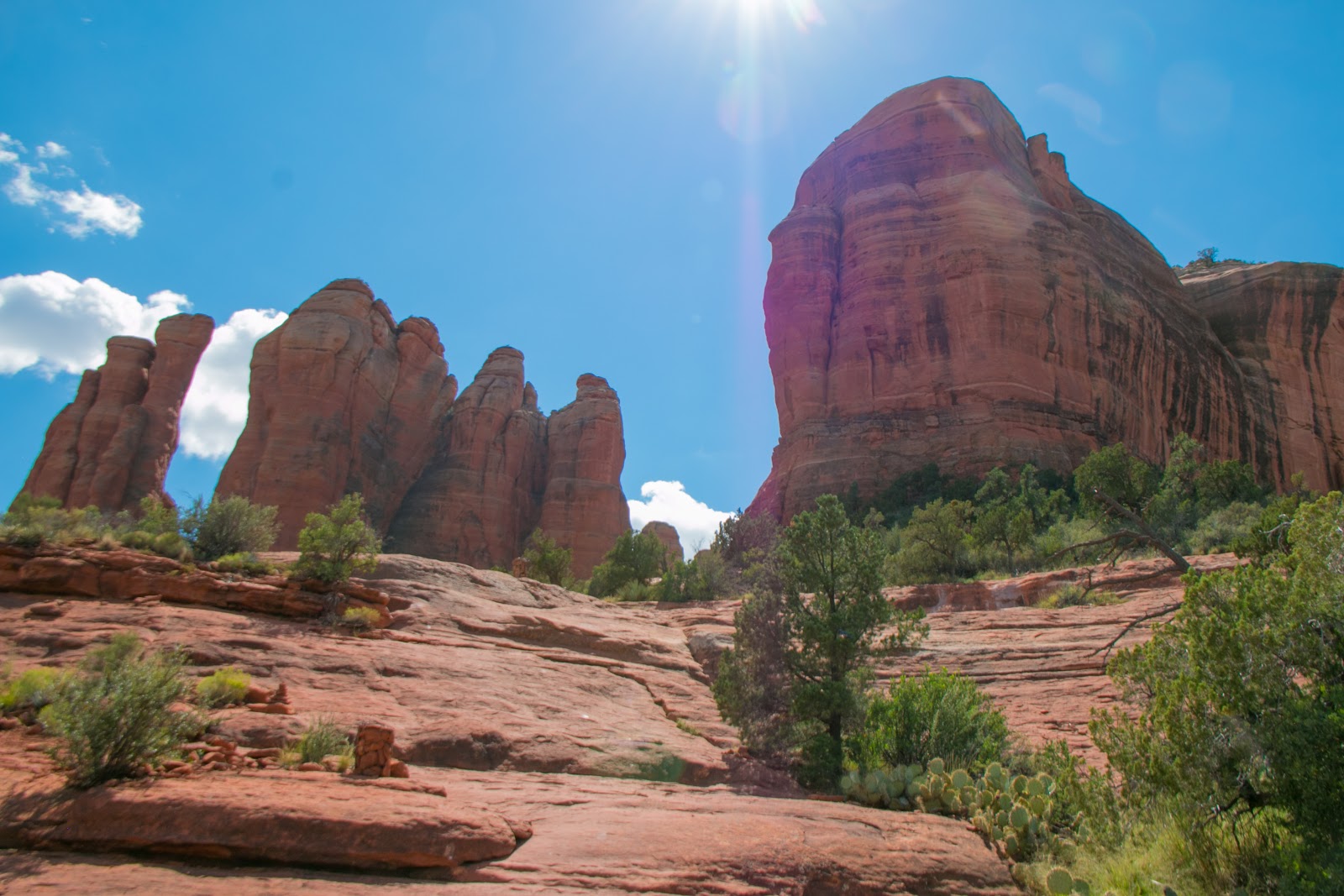 The spires of Cathedral Rock rising above the steep trail in Sedona