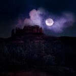 Full moon hikes in Sedona: Cathedral Rock under a bright full moon and a sky full of stars