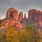Cathedral Rock framed by golden fall color along Oak Creek near the Village of Oak Creek, Sedona